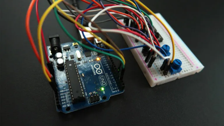 Arduino Uno connected to buttons and potentiometers on a breadboard